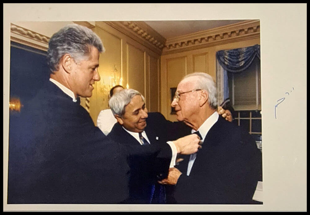 Rare Photograph: Iconic Original Photo Clinton adjusting Rabin's tie Hand-Signed by Yitzhak Rabin, 1995